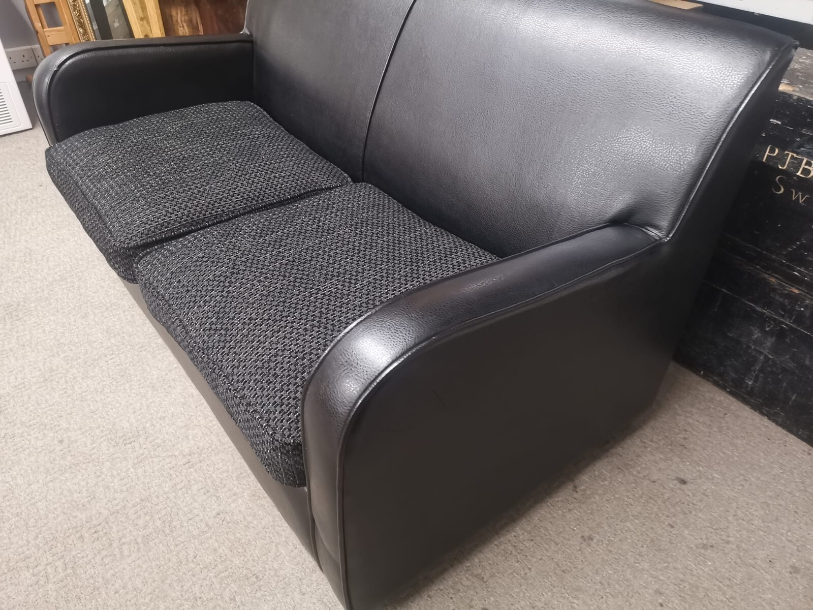 Lovely black 2 seater metal action sofa bed from DFS, local delivery