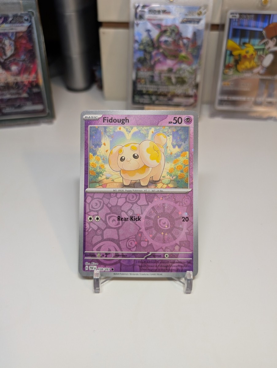 Pokemon Paldean Fates 038/091 Fidough Cosmos/Reverse Holo