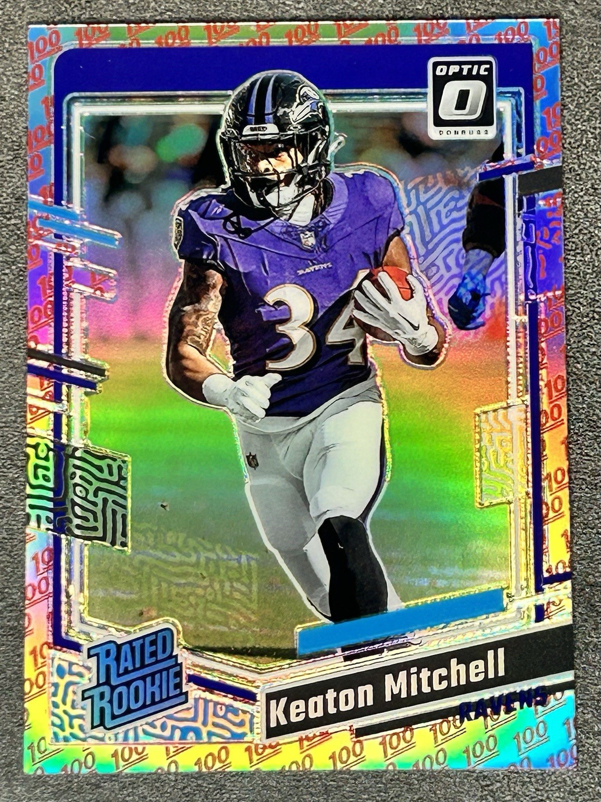 Keaton MItchell 2025 Panini Donruss Optic "100" Emoji Prizm SSP Rookie RC #207