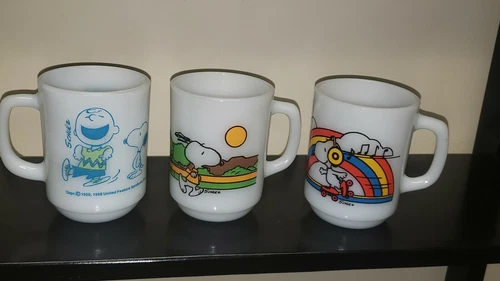 3 FIRE KING ANCHOR HOCKING SNOOPY SKATING MILK GLASS MUGS & CHARLIE BROWN 