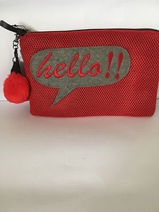 small red clutch bag