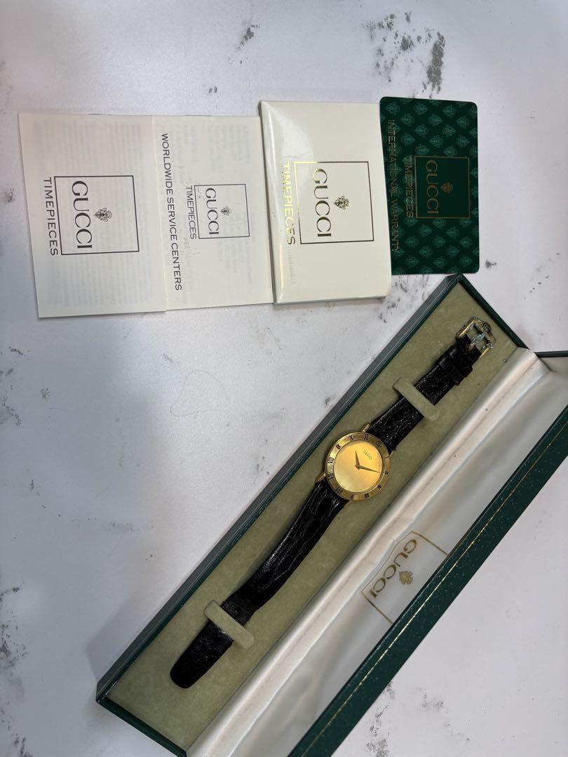 Gucci Mens Black Watch with Gold Dial Quartz Movement  