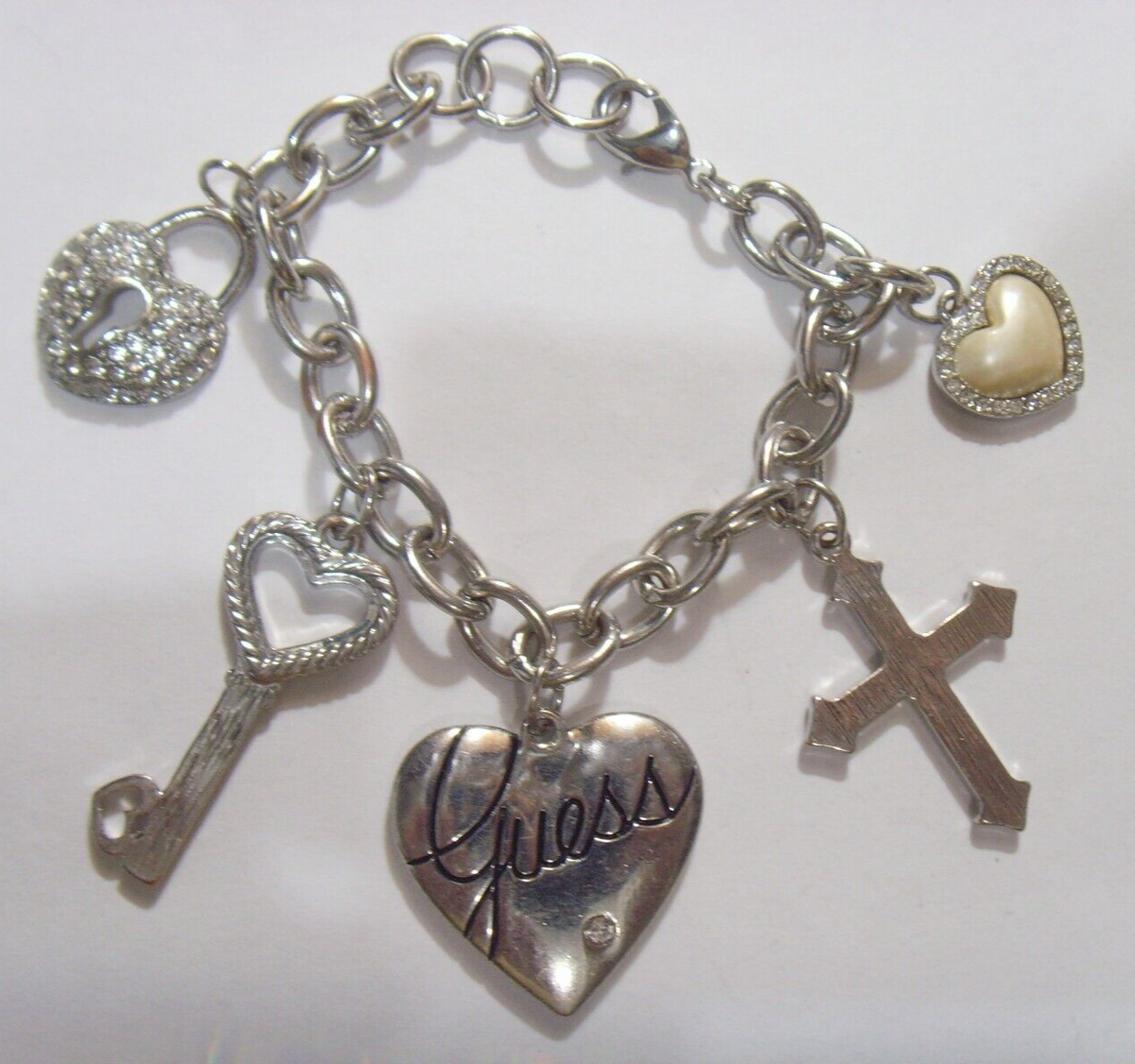 vintage Guess brand Christian Love Cross silver tone metal
