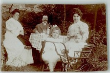 38208750 - 9307 Geyer family man woman girl child pram place according to