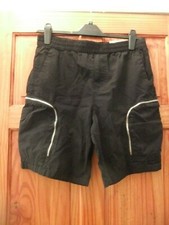 Image of Black cotton cargo shorts to fit waist 32 inch.With pockets.
