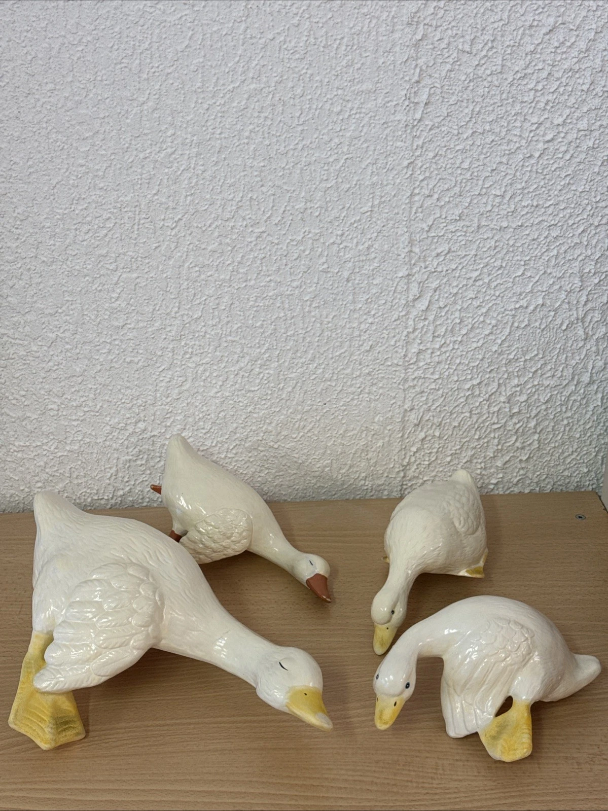 Ensemble de 4 oies décoratives en porcelaine ?