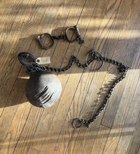 Authentic prisoner ball-and-chain from escaped chain gang prisoner and handcuffs