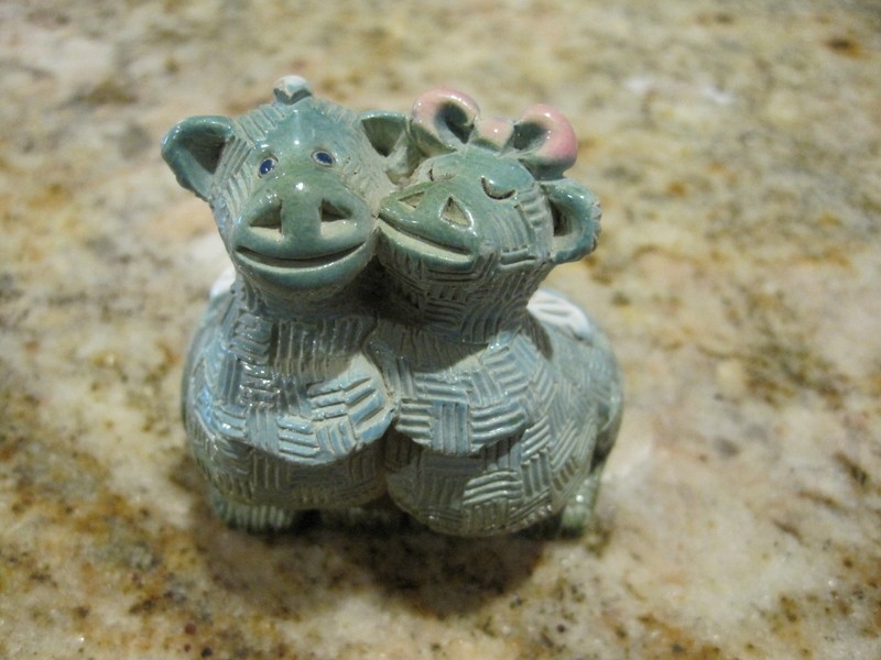 SIGNED RINCONADA  TWO HUGGING DRAGONS  FIGURINE