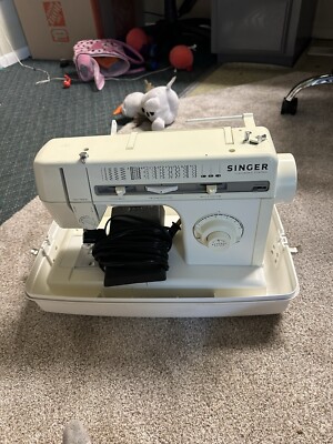 Sewing Machine Perfect Condition And Comes With A Few supplies