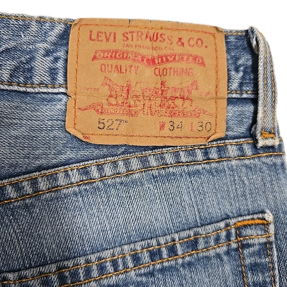Pantalones de mezclilla vintage Levi’s 527 para hombre 34x30 tiro bajo calce bota Y2K 2003 desgastados Foto 3 de 4