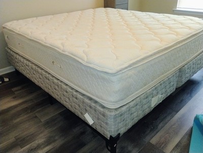 King-size Serta bed. White, quilted pillow top. Perfect condition.