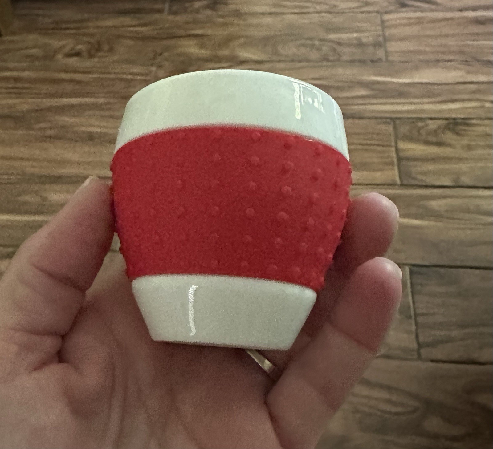 Bodum Pavina porcelain mug with a red silicone sleeve. 2.5” Tall With 2 3/8” Dia