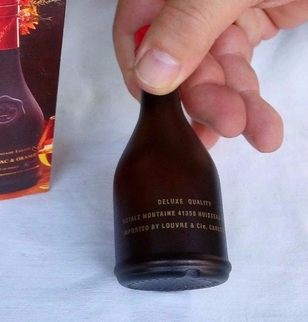 BOTELLA MINIATURA ROYALE MONTAIN FRANCE COÑAC Y NARANJA. VACÍO. Foto 4 de 4