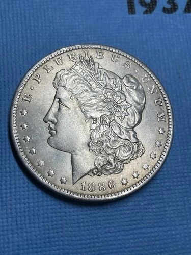 1886-O Morgan Silver Dollar Au/Unc Condition