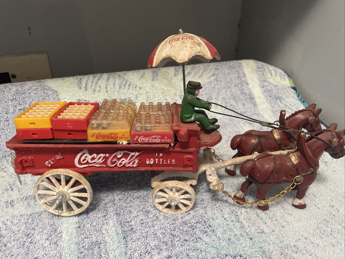 VINTAGE CAST IRON COCA COLA HORSE DRAWN WAGON UMBRELLA COKE VINTAGE CAST IRON COCA COLA HORSE DRAWN WAGON UMBRELLA COKE