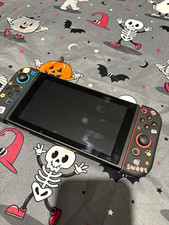 Nintendo Switch Console w/ Dock & Power Adaptor, Joy-Cons, and Mario Odyssey