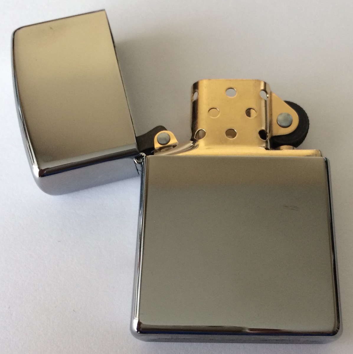 Zippo Windproof 2-Tone Polished Chrome Lighter With Gold Insert