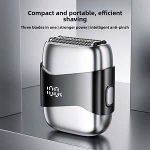 Magnetic three-knife head reciprocating mini electric shaver