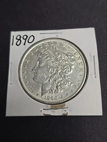1890 AU MORGAN SILVER DOLLAR 90%