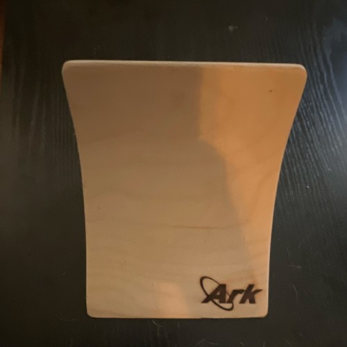 Ark Wood fingerboard quarter pipe. Wooden ramp
