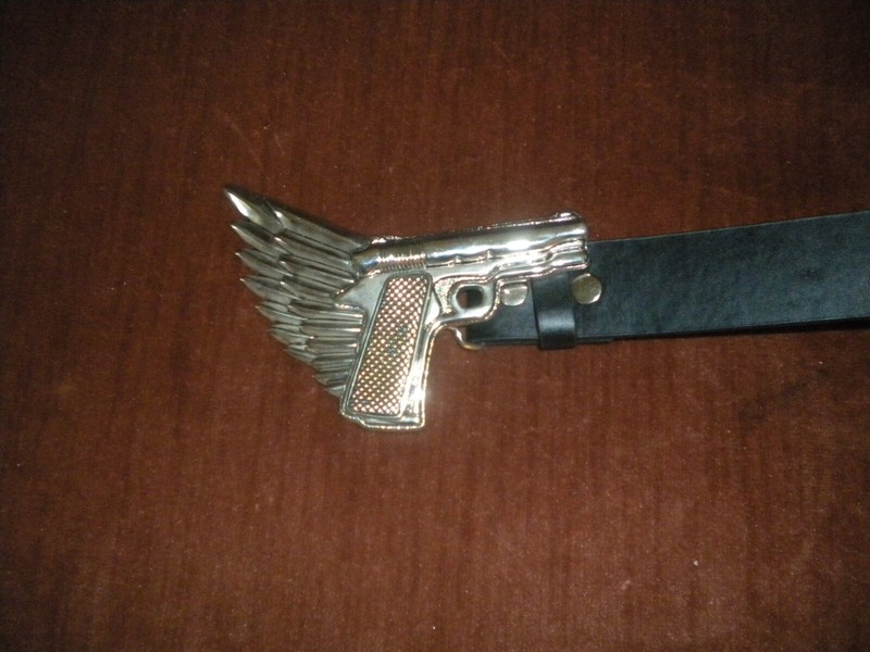BRAND NEW  BUCKLE WITH  A GUN WITH WINGS  SILVER  BUCKLE        ONLY BUCKLE