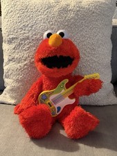 Singing Elmo Sesame Street Rock and Rhyme with guitar plush toy. 15" tall