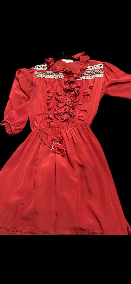 aztec dress red W A R R I O R E L E G A N C E This bold red gown blends ethereal beauty with Aztec symbolism, featuring intricate handmade macram on the