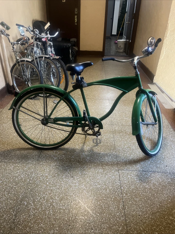 Hermosa bicicleta verde para adultos Foto 2 de 3