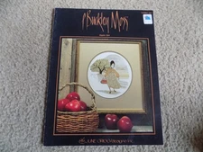 JUNE GRIGG DESIGNS - CCS Leaflet #101 - P. Buckley Moss -  APPLE GIRL