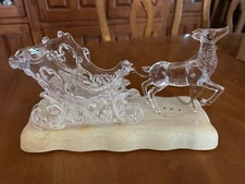 ACRYLIC LIGHT UP REINDEER AND SLEIGH TABLE TOP LIGHT UP DISPLAY PLAYS MUSIC