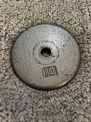 (1) 10 Pound Standard 1 Inch Hole Pancake Style Barbell Weight Plate.