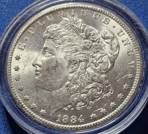 A 1884 CC Morgan Silver Dollar $1 Choice/Gem BU.  Blast White!