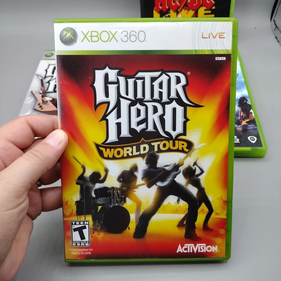 Lot of 4 Xbox 360 Guitar Hero II & World Tour, Rock Band 2 & AC/DC Track Pack - Image 2 of 4