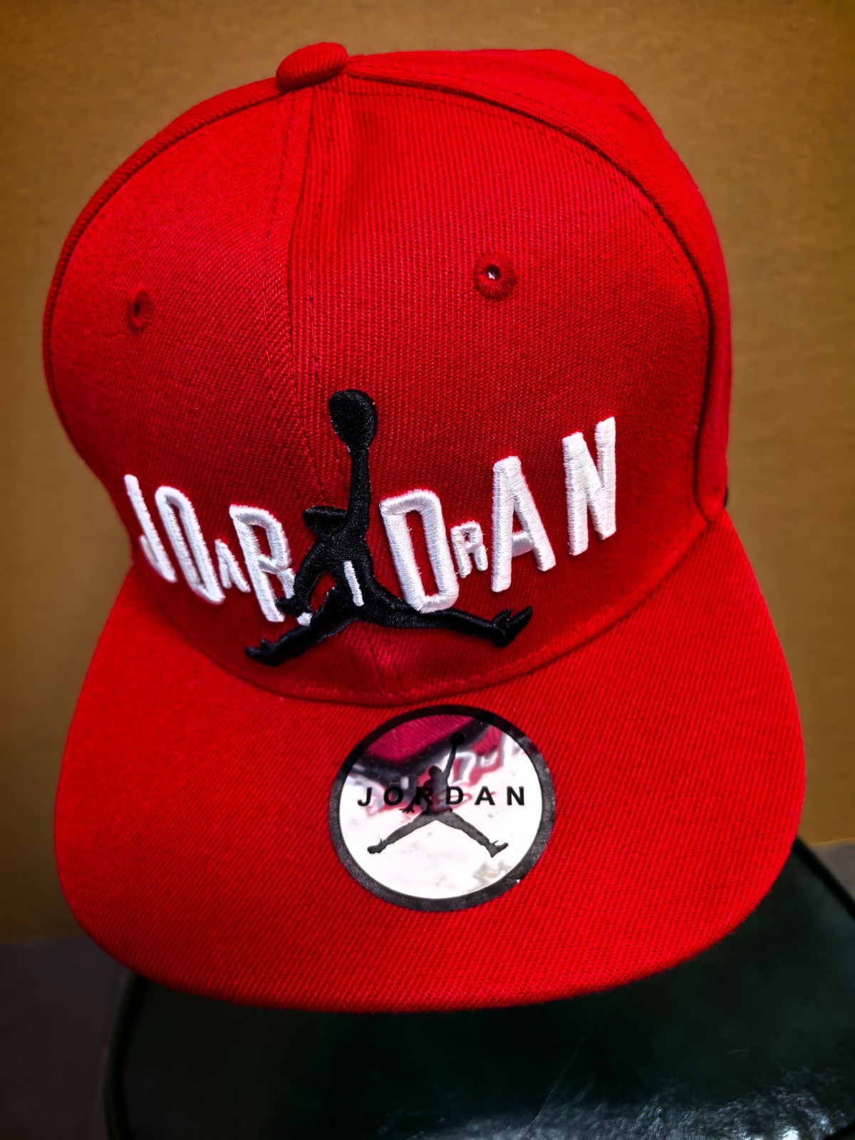 Jordan red adjustable baseball cap with embroidered logo and adjustable size