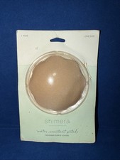 a pair of Shimera water resistant reusable nipple covers.
