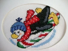 COMPLETED FINISHED CROSS STITCH CARD ''SLEDDING PENGUIN"