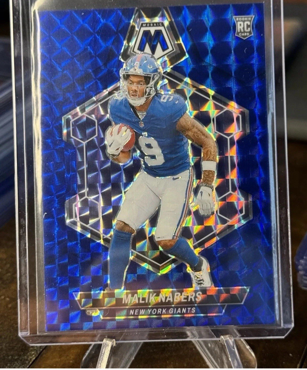 2024 Panini Mosaic - Rookies Malik Nabers #306 Blue Mosaic Prizm /99 (RC)