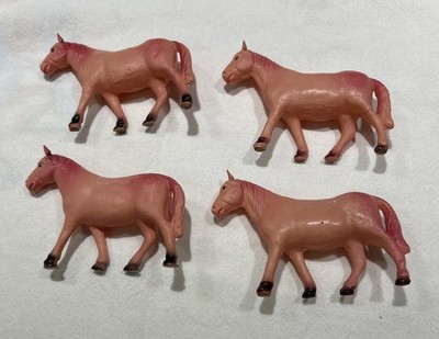 Set of Four Light Pink Celluloid  Horses