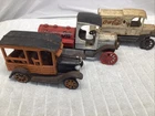 Lot Of 3 Vintage 1920-1930’s Cast Iron Trucks/ Duggan Oil/ Coca-Cola/Taxi-Cab