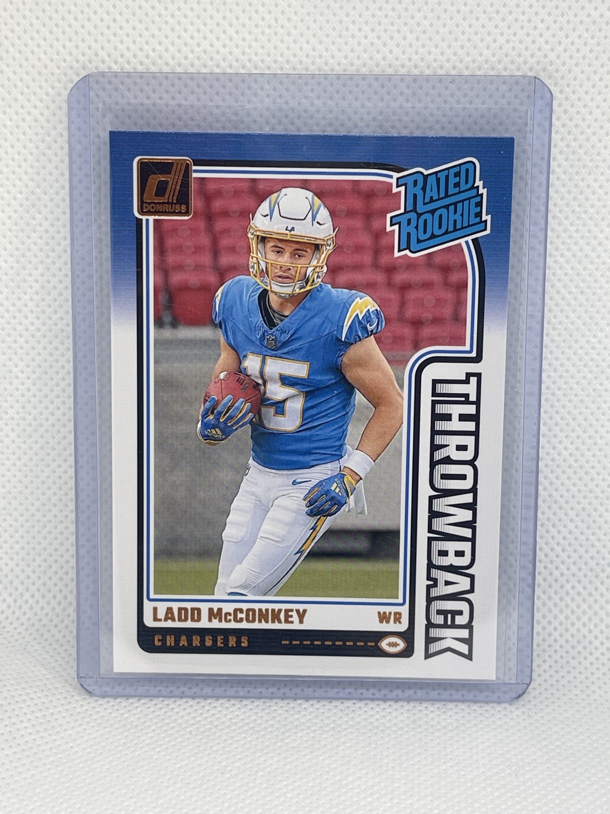2024 Panini Donruss Rated Rookie Throwback Ladd McConkey #23 Chargers (RC)