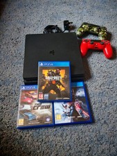 PS4 500 GB.  2 CONTROLS AND 3 GAME