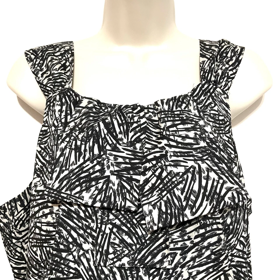 Blusa sin mangas Mossimo XL negra lt bronceada ligera plata brillo lazo geométrico Foto 4 de 4