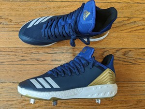 navy and gold baseball cleats