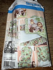Simplicity Pattern 3954 Nursery Crib Set Curtain Crib Quilt Sheet Caddy Cushions
