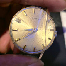 Remington Men’s Dress Analog Wristwatch Gold Dial Gold Case Baton Indexes