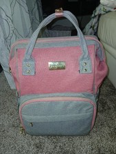 A cozyland diaper bag/bookbag for women.