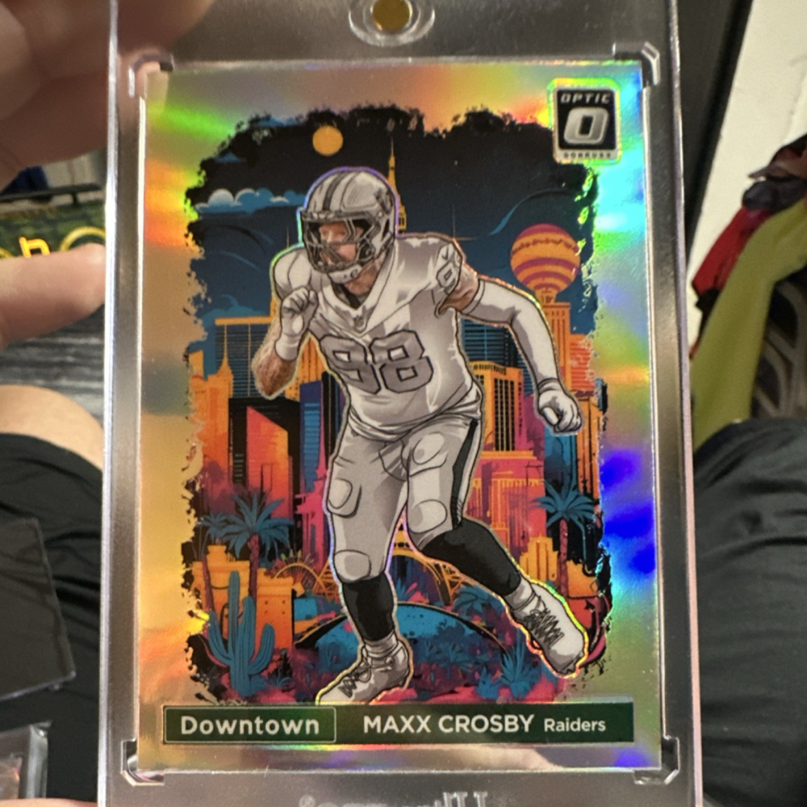 2024 Panini Donruss Optic Downtown! Maxx Crosby Prizm #23 Raiders NFL