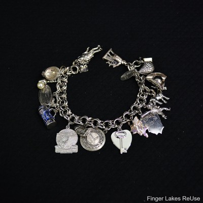 Sterling Silver Charm Bracelet with 16 Charms of Varying Sizes