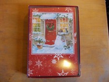 Pack of 10 Leanin' Tree Christmas cards with designed envelopes.
