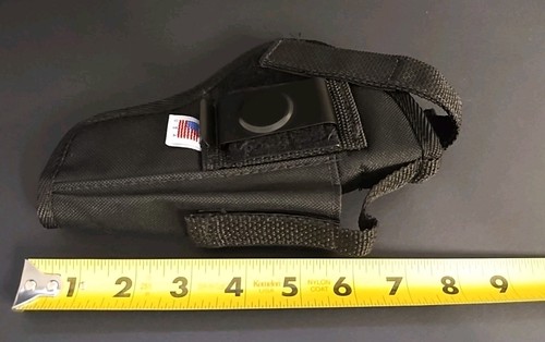 Black nylon IWB holster with black strap, double stitching, and molded pistol shape on a dark background.
